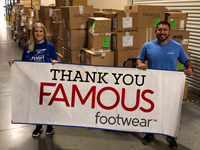Ticket to Dream’s Program Director Mauri Knowles and Program Officer Juan Garcia unload 12,000 pairs of shoes at Pride Industries in Roseville, CA. The shoes were donated by Famous Footwear and they will be shipped across the country to non-profit, foster care agencies that partner with Ticket to Dream. (Photo: Business Wire)